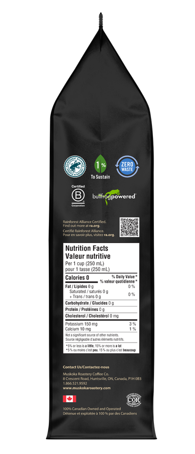 Load image into Gallery viewer, Black coffee packaging with nutritional information on a white background