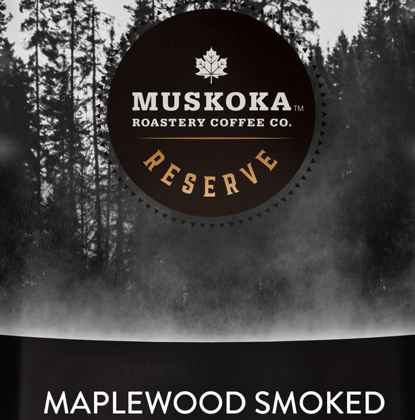 Muskoka Roastery Coffee Co. Reserve Maplewood Smoked coffee packaging with forest background
